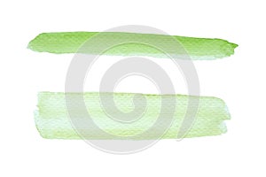 Green watercolor brush painting on paper isolated on white background, Art abstract illustration, textured design banner,