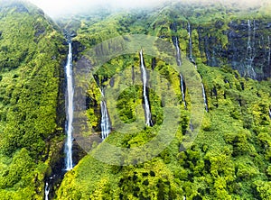 Green waterfall tropical landscape - Ribeira do Ferreira, green paradise hidden in Flores Island, Azores, Portugal, Pozo da photo