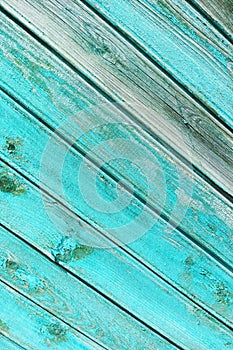 Green weathered boards  peeling paint. Background texture