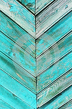 Green weathered boards  peeling paint. Background texture