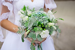 Green wedding bouquet with eustoma and hydrangea