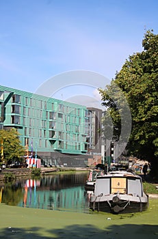 Green weed, boats, Regent`s Canal, Mile End lock