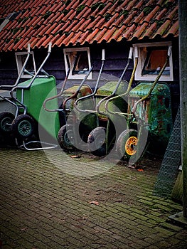 Green wheelbarrows