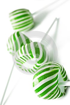 Green and white candy lolly pops