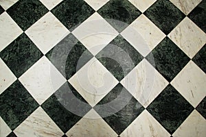 Green and white checkered marble floor pattern