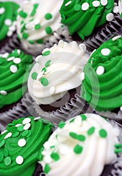 Green and White Cupcakes on a slant