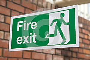 Green and White Fire Exit Sign