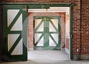 Green and white horse stable doors
