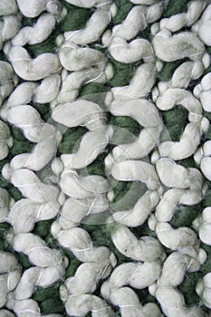 Green and white knitted wool background