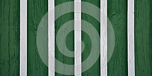 Green and white painted wooden wall vertical plank background stripes wood texture