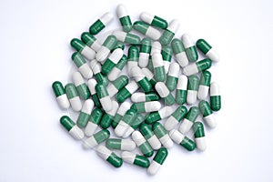 Green and white pills