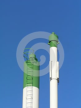 Green and white smokestack