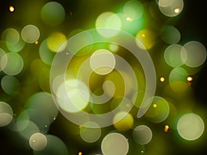 Green white and yellow abstract blurred lights full frame bright glowing glitter effect on a dark background