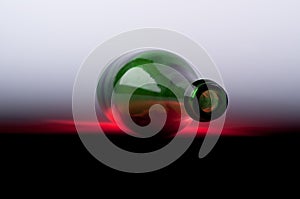 Green wine bottle on white background