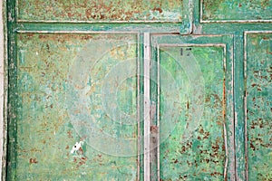 Green wooden door close up. Old style. weathered