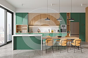 Green and wooden kitchen interior with island