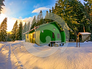 Green wooden mountain hut at the Velebit mountain