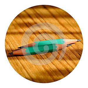 Green wooden pencils opened with a pencil sharpener