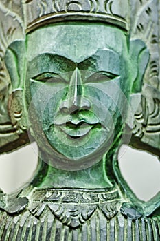 Green Wooden Sculpture of Buddhist Deity