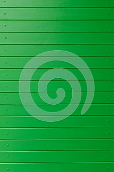 Green wooden wall panel as background