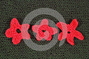 Green wool material with ornament