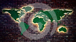 Green World map on bricks wall having light in background