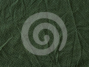 Green wrinkled fabric texture background