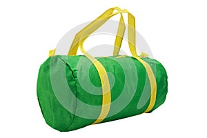 Green and yellow duffel bag isolated on white