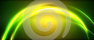 a green and yellow glowing circle on a dark background