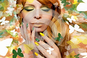 Green yellow makeup and manicure.