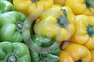 green and yellow Peppers at the market stall