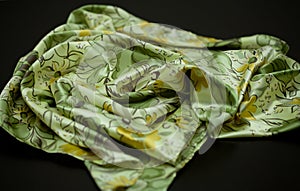 Green, yellow tender colored textile, elegance rippled material