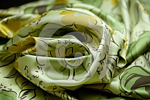 Green, yellow tender colored textile, elegance rippled material