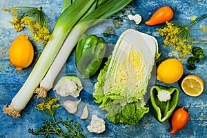 Green and yellow veggies group. Vegetarian dinner ingredients. Green vegetables variety. Overhead, flat lay, top view.