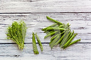 Green young peas on a table