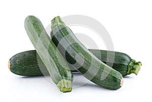 Green zucchini on white background