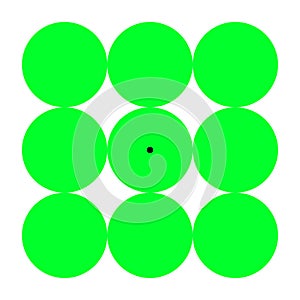 Green discs inducing a pink negative afterimage and optical illusion