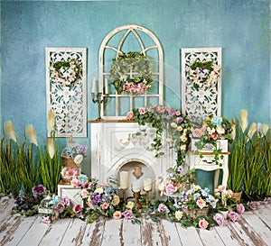 Greenery decorations with lavender, pink, blue flowers and fireplace, romantic mood