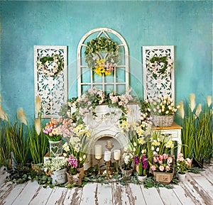 Greenery decorations with pastel flowers and fireplace, romantic mood