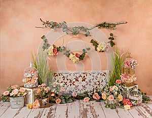 Greenery decorations with peach, somon, flowers and fireplace, romantic mood photo