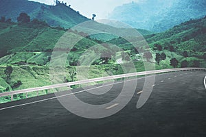 greenery hill and mountain landscape with road advertisement background