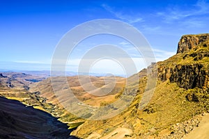 Greenery in Sani pass under blue sky near kingdom of Lesotho South Africa border near KZN and Midlands meander
