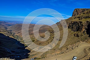 Greenery in Sani pass under blue sky near kingdom of Lesotho South Africa border near KZN and Midlands meander