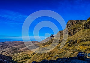 Greenery in Sani pass under blue sky near kingdom of Lesotho South Africa border near KZN and Midlands meander