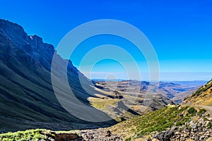 Greenery in Sani pass under blue sky near Lesotho South Africa b