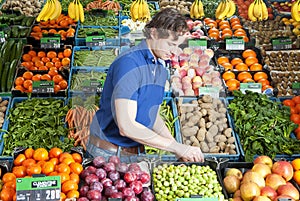 Greengrocer at work