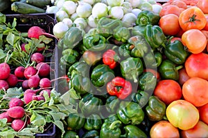 Greengrocers radish tomatoes green red peppers photo