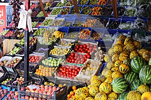 Greengrocers' shop, with an electronic scale, and photo