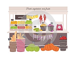 Greengrocery shop with awning or marketplace with fresh fruits, vegetables, scales and price tags. Place for selling photo