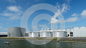 Greenhouse with storage tanks infront - netherlands